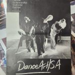 Printed black and white program cover reading "Carver Community Cultural Center Presents DanceArt/S.A.," featuring a photograph of dancers in motion, bending and leaning across a stage.